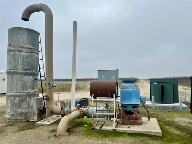 a view of a lake with a yard