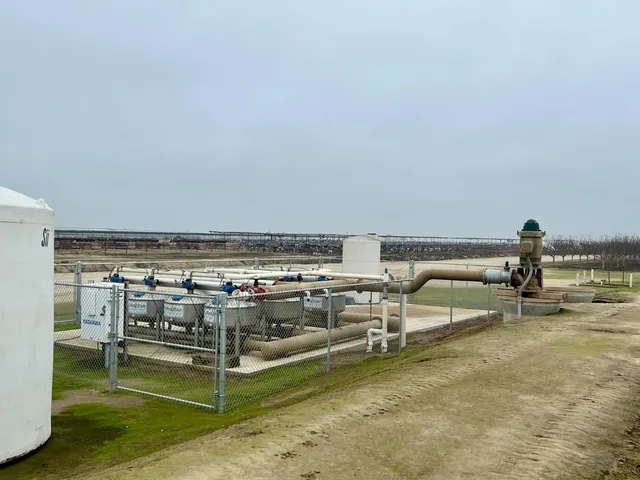a picture of a bench in front of a building