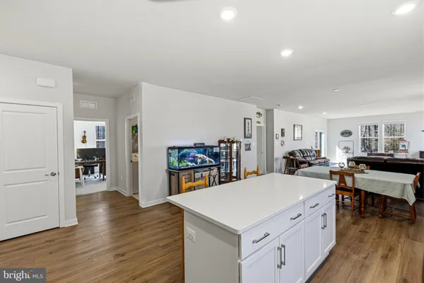 a dining room with furniture and a fireplace