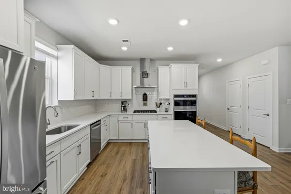 a view of a kitchen and dining room