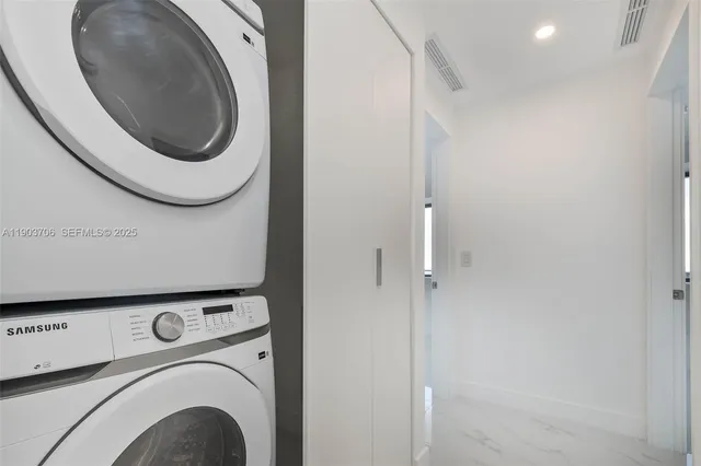 a view of a swimming pool with a lounge chair