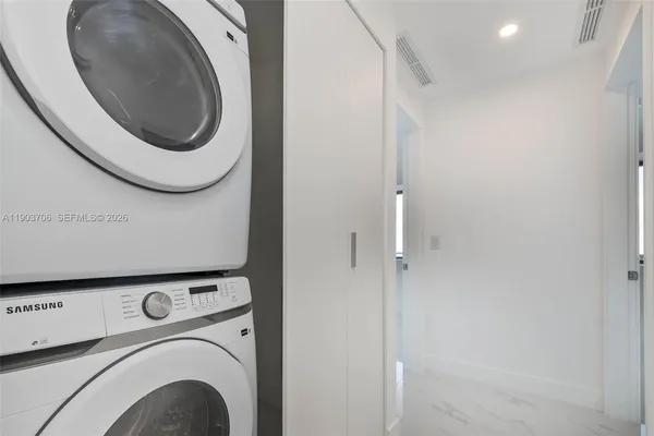 a view of a swimming pool with a lounge chair