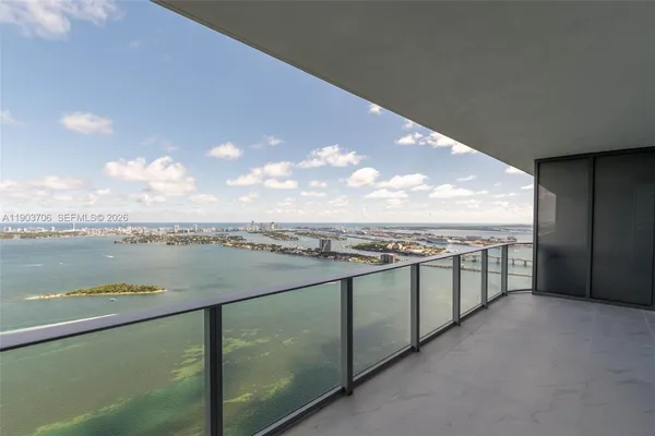 a view of a balcony with an ocean view