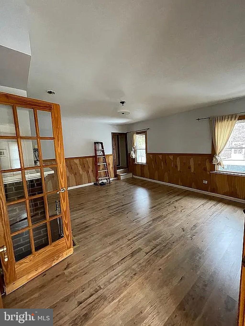 1715 Rhawn Street Philadelphia, PA 19111 - Photo 11 of 29 a view of kitchen and hall with wooden floor