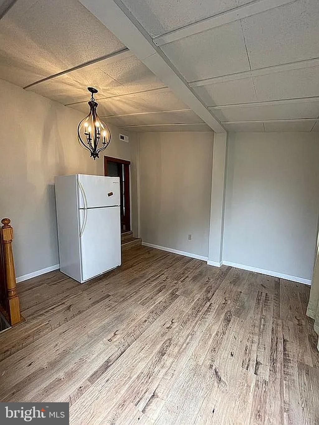 1715 Rhawn Street Philadelphia, PA 19111 - Photo 16 of 29 a view of a room with wooden floor