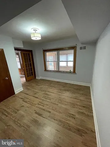 a view of an empty room and window