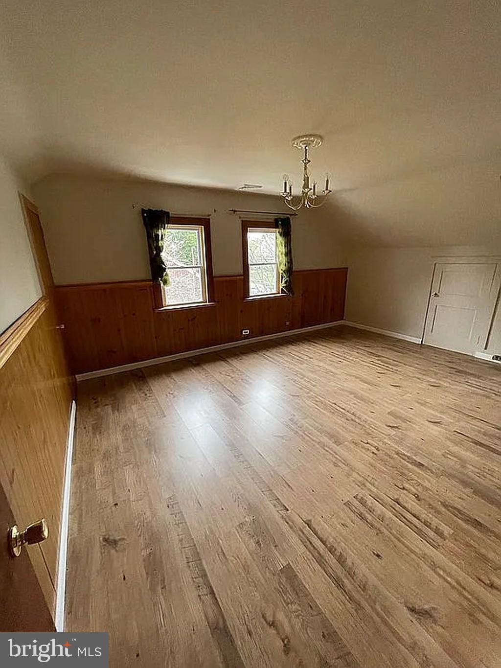 1715 Rhawn Street Philadelphia, PA 19111 - Photo 20 of 29 an empty room with wooden floor and windows