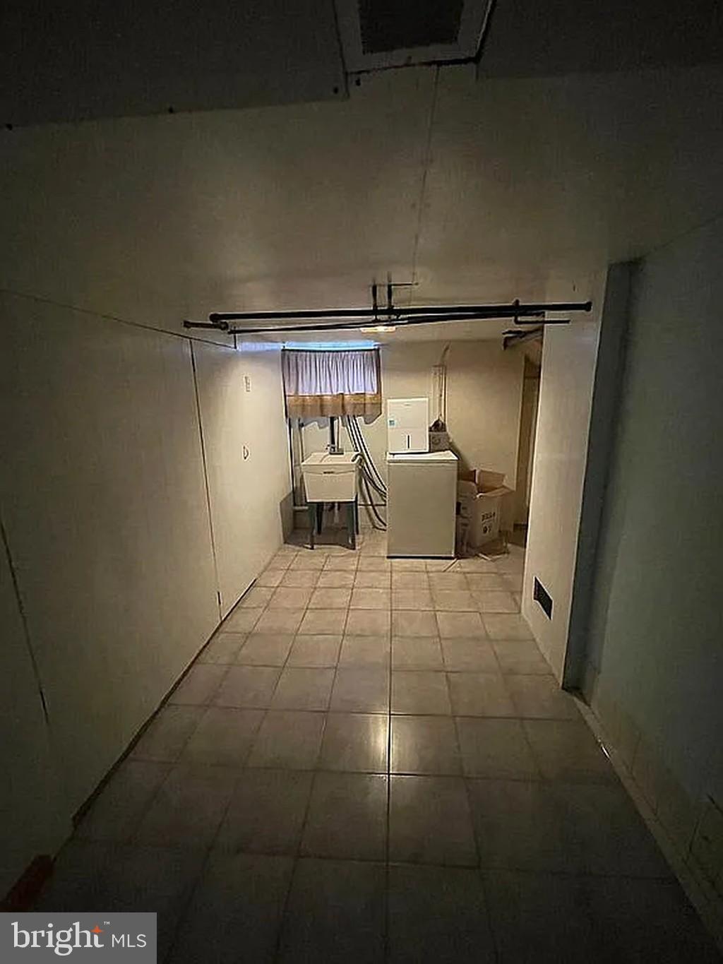 1715 Rhawn Street Philadelphia, PA 19111 - Photo 29 of 29 a view of a room with racks on the wall