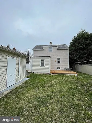 a house view with a backyard space