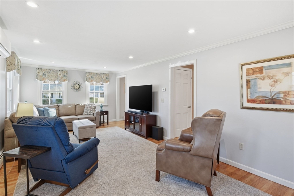 283 Forest Glen West Springfield, MA 01089 - Photo 17 of 40 a living room with furniture and a flat screen tv