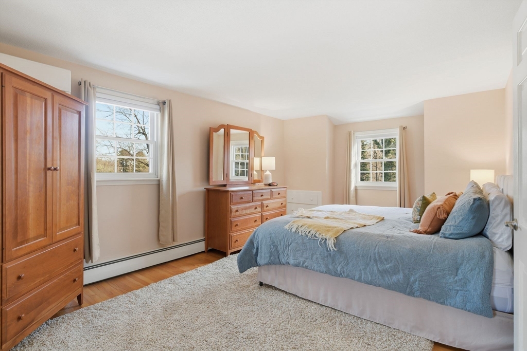 283 Forest Glen West Springfield, MA 01089 - Photo 22 of 40 a bedroom with a large bed and a window
