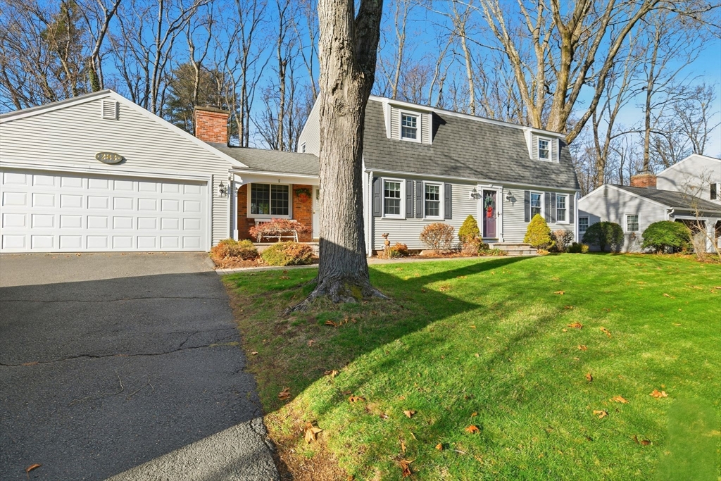 283 Forest Glen West Springfield, MA 01089 - Photo 3 of 40 a front view of a house with a yard and garage