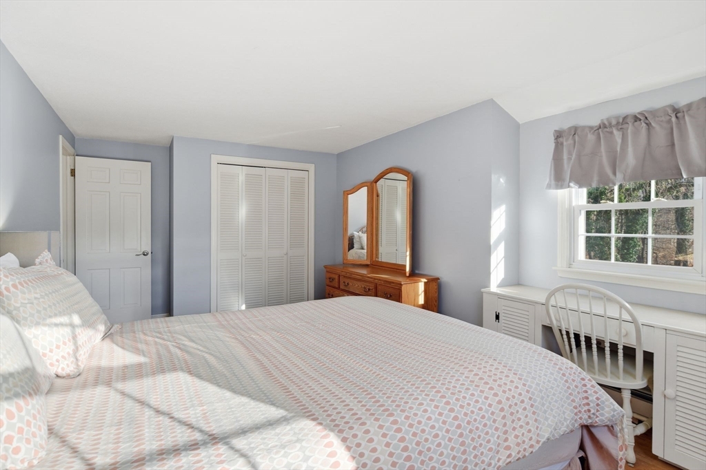 283 Forest Glen West Springfield, MA 01089 - Photo 32 of 40 a bedroom with a large bed and a window