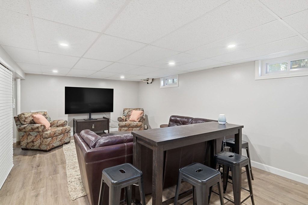 283 Forest Glen West Springfield, MA 01089 - Photo 35 of 40 a living room with furniture and a flat screen tv