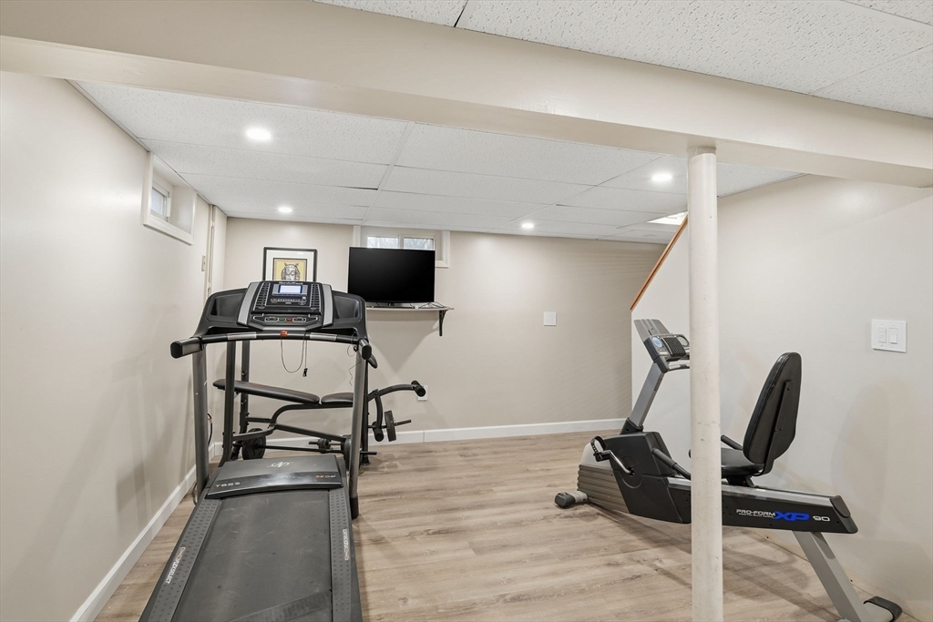 283 Forest Glen West Springfield, MA 01089 - Photo 36 of 40 a view of a room with gym equipment and wooden floor