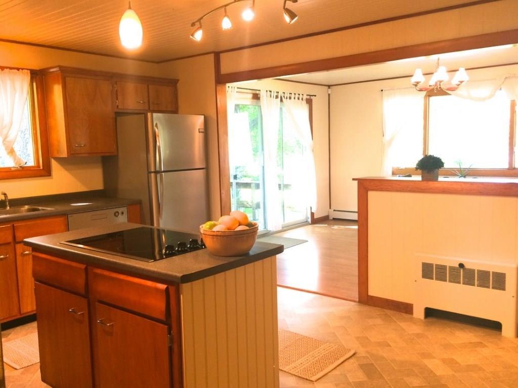 202 Little Deer Isle Road Little Deer Isle, ME 04650 - Photo 18 of 35 Cooktop looking out toward dining area