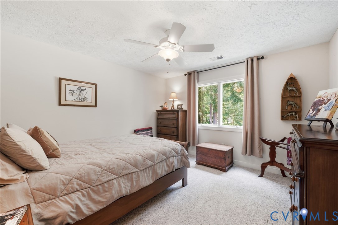 210 Riverview Road Stevensville, VA 23161 - Photo 40 of 63 Bedroom featuring neutral wall paint, carpet floor