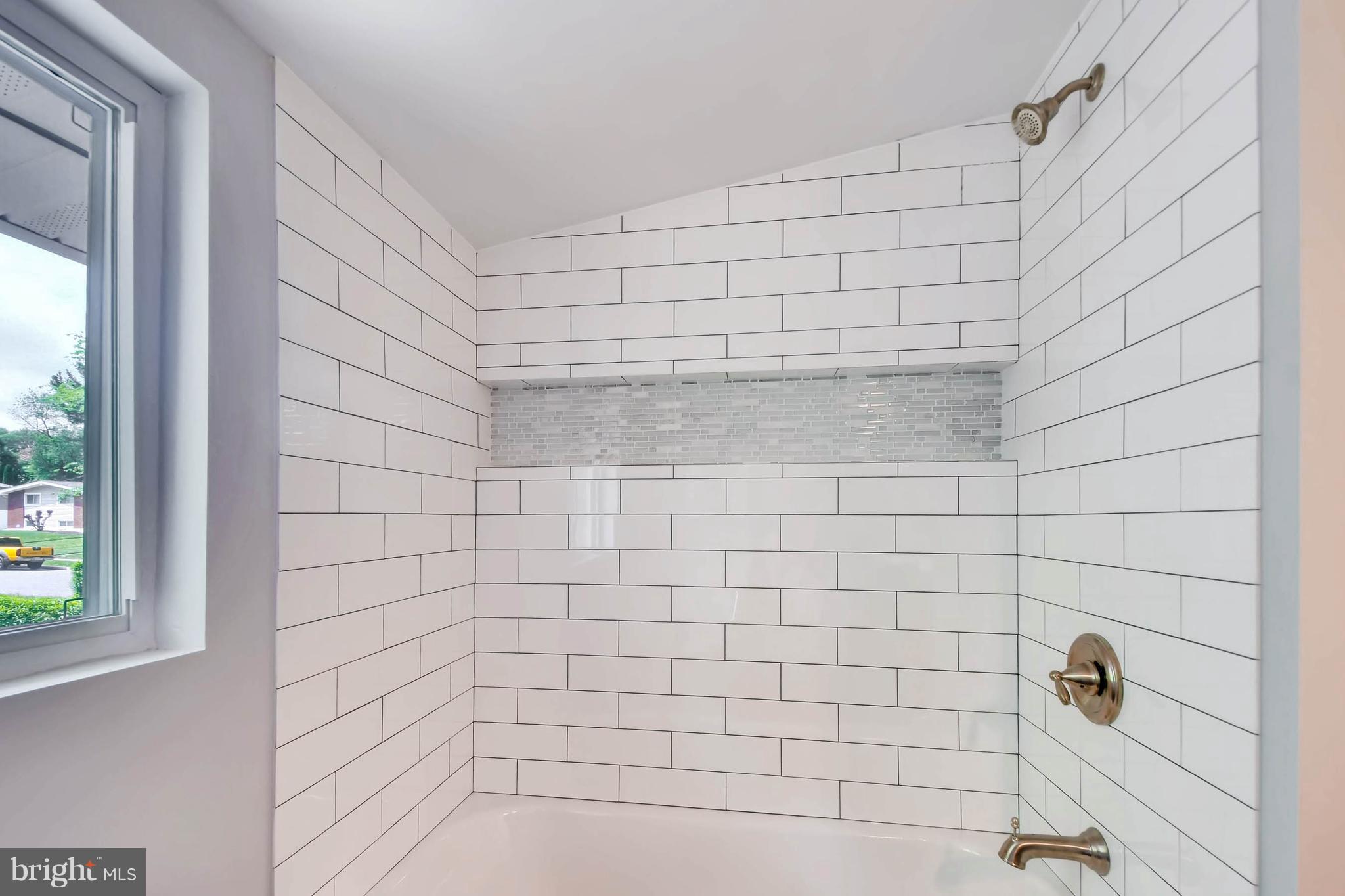4707 Maryknoll Road Baltimore, MD 21208 - Photo 19 of 29 Master shower with custom tile