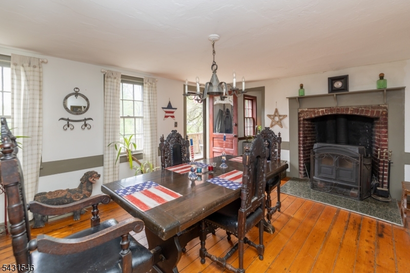 490 Mine Road Asbury, NJ 08802 - Photo 16 of 39 a living room with furniture a fireplace and window