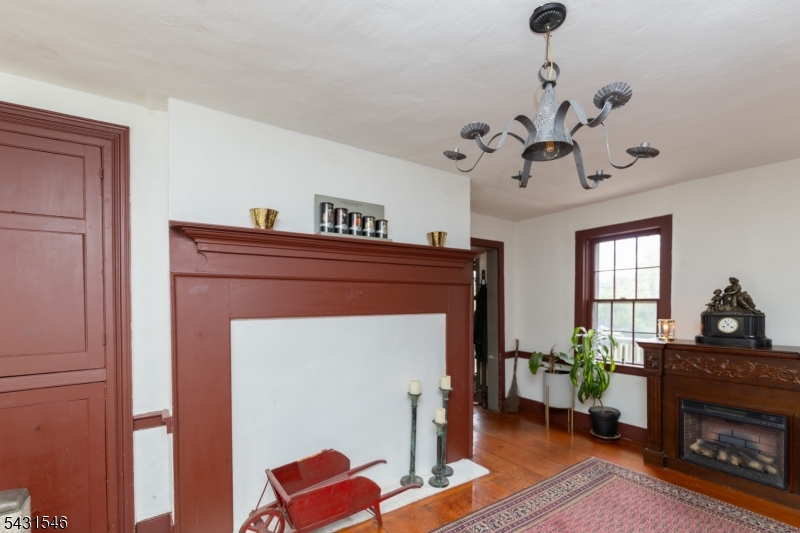 490 Mine Road Asbury, NJ 08802 - Photo 18 of 39 a living room with furniture and a fireplace