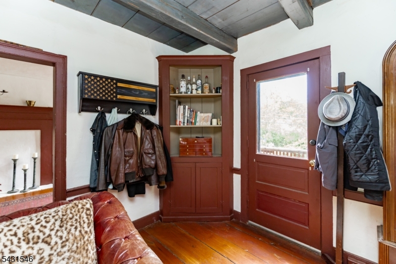 490 Mine Road Asbury, NJ 08802 - Photo 22 of 39 a view of walk in closet with clothes and shoes