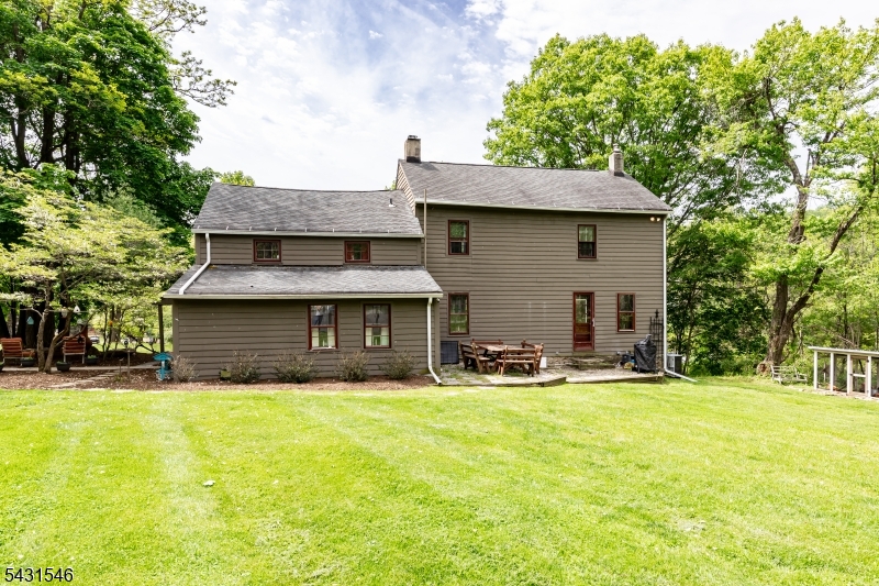 490 Mine Road Asbury, NJ 08802 - Photo 3 of 39 a front view of a house with yard and trees