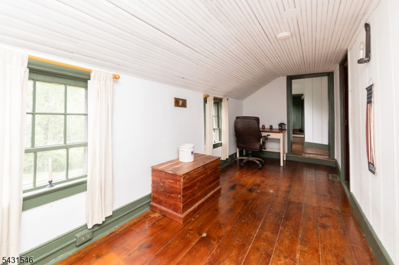 490 Mine Road Asbury, NJ 08802 - Photo 33 of 39 a view of workspace with wooden floor and chair