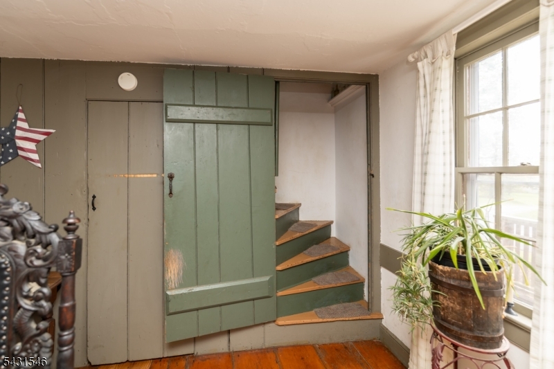 490 Mine Road Asbury, NJ 08802 - Photo 34 of 39 a view of entryway with wooden floor and stairs