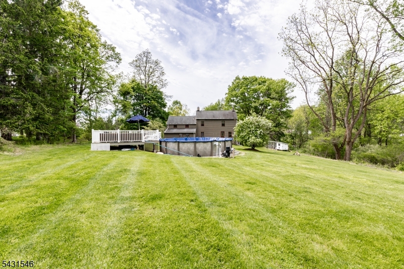 490 Mine Road Asbury, NJ 08802 - Photo 7 of 39 a view of a house with pool and a yard