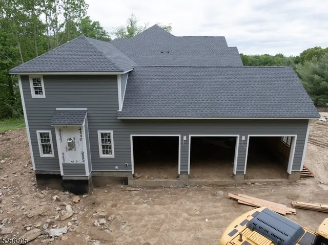 a front view of a house with a garage