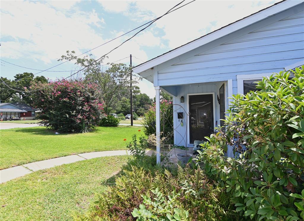 1916 Tierney Road Fort Worth, TX 76112 - Photo 11 of 12 side of home and front lawn