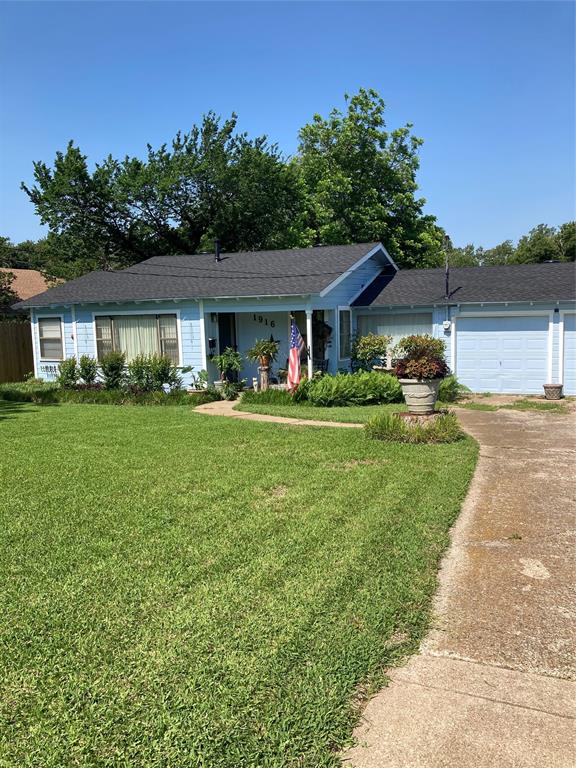 1916 Tierney Road Fort Worth, TX 76112 - Photo 2 of 12 Single story home featuring a garage, a front yard, and concrete driveway