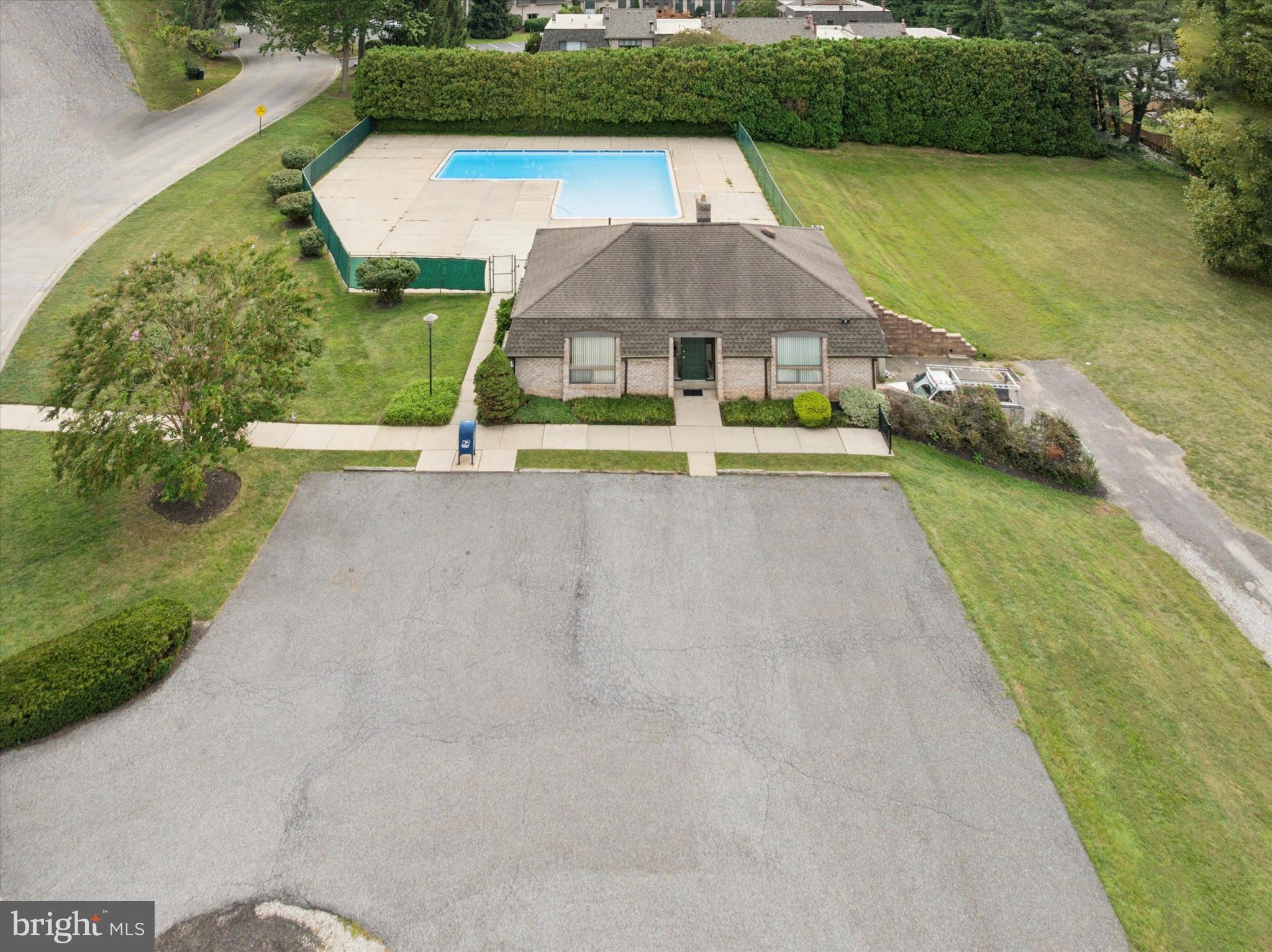 856 Putnam Boulevard, Unit 67A Wallingford, PA 19086 - Photo 22 of 26 swimming pool view with a outdoor space