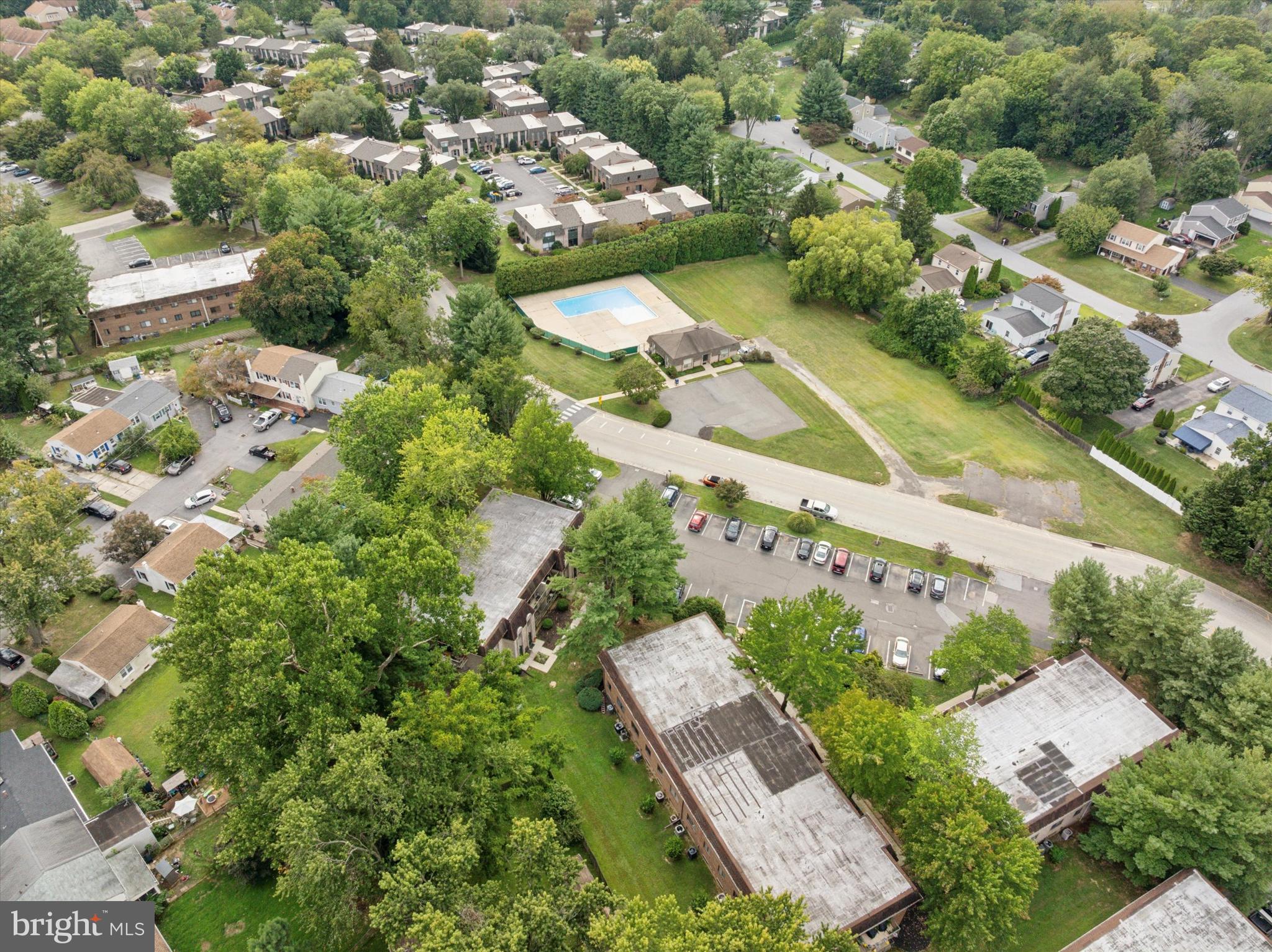 856 Putnam Boulevard, Unit 67A Wallingford, PA 19086 - Photo 23 of 26 an aerial view of residential houses with outdoor space