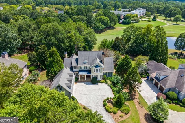 an aerial view of a house with a garden