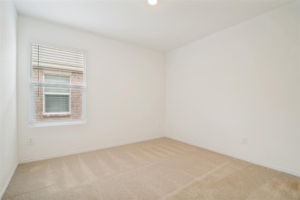 1345 Cider Street Forney, TX 75126 - Photo 14 of 15 a view of an empty room with a window