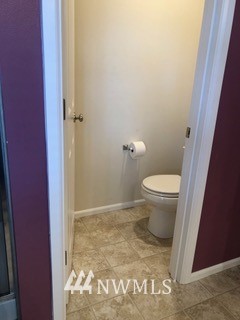 3032 Eagle Loop Northeast Lacey, WA 98516 - Photo 13 of 23 a bathroom with a toilet