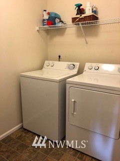 3032 Eagle Loop Northeast Lacey, WA 98516 - Photo 19 of 23 a utility room with dryer and washer