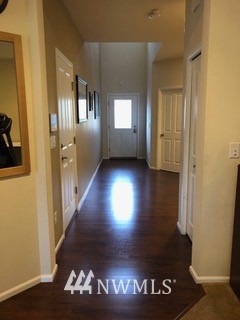 3032 Eagle Loop Northeast Lacey, WA 98516 - Photo 3 of 23 a view of gallery with wooden floor
