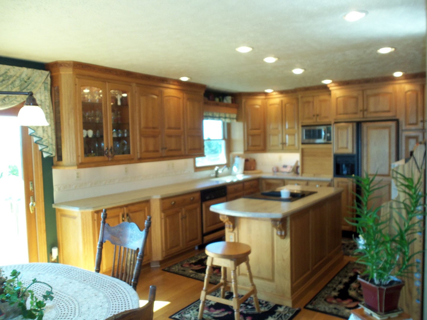 2874 East 28th Road Seneca, IL 61360 - Photo 12 of 51 a kitchen with stainless steel appliances granite countertop a sink and a refrigerator