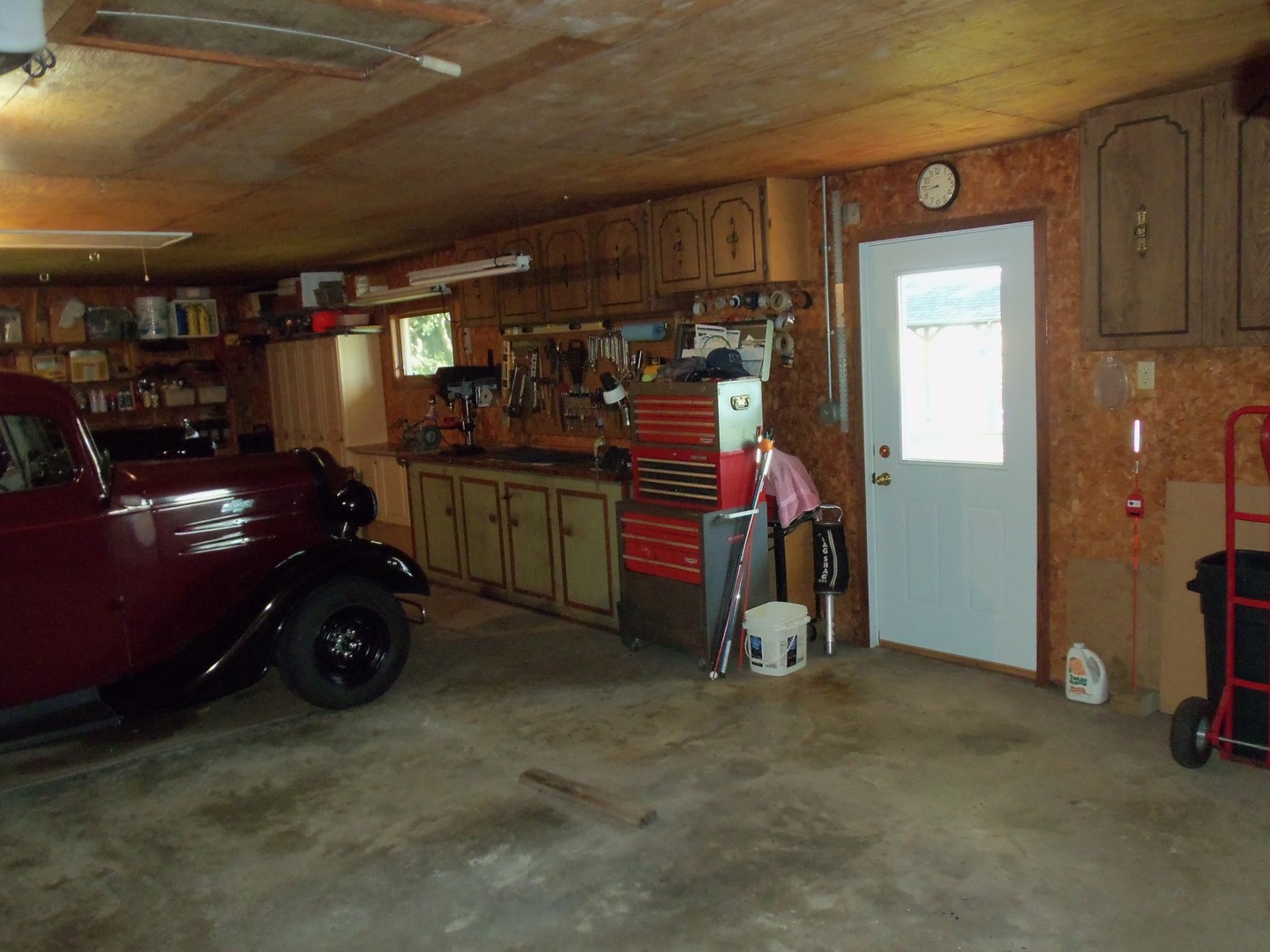 2874 East 28th Road Seneca, IL 61360 - Photo 36 of 51 a car parked in garage