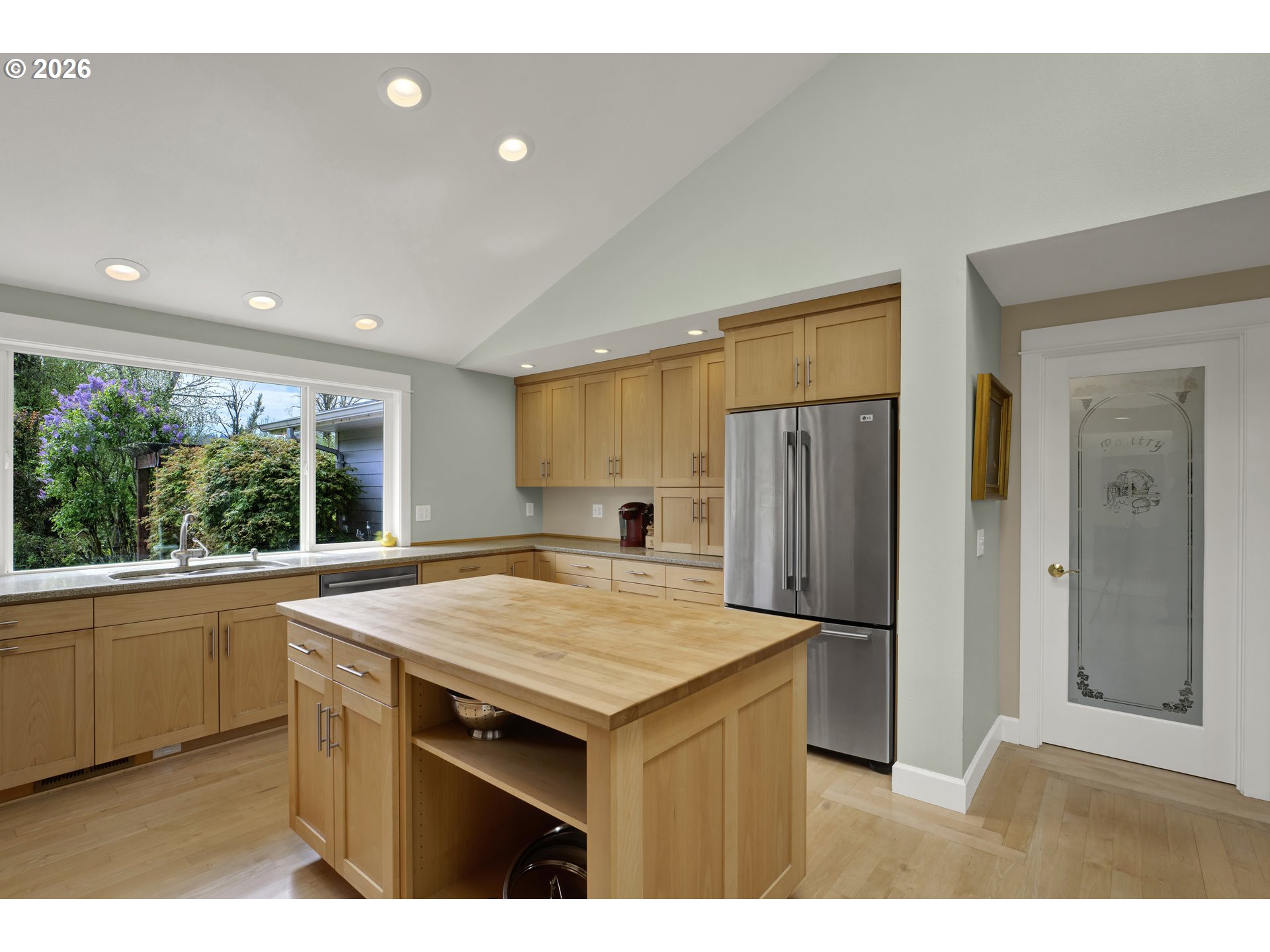 7924 Thurston Road Springfield, OR 97478 - Photo 19 of 45 a kitchen with a stove a refrigerator and a sink