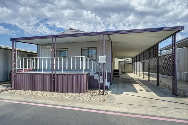 a view of a house with a balcony