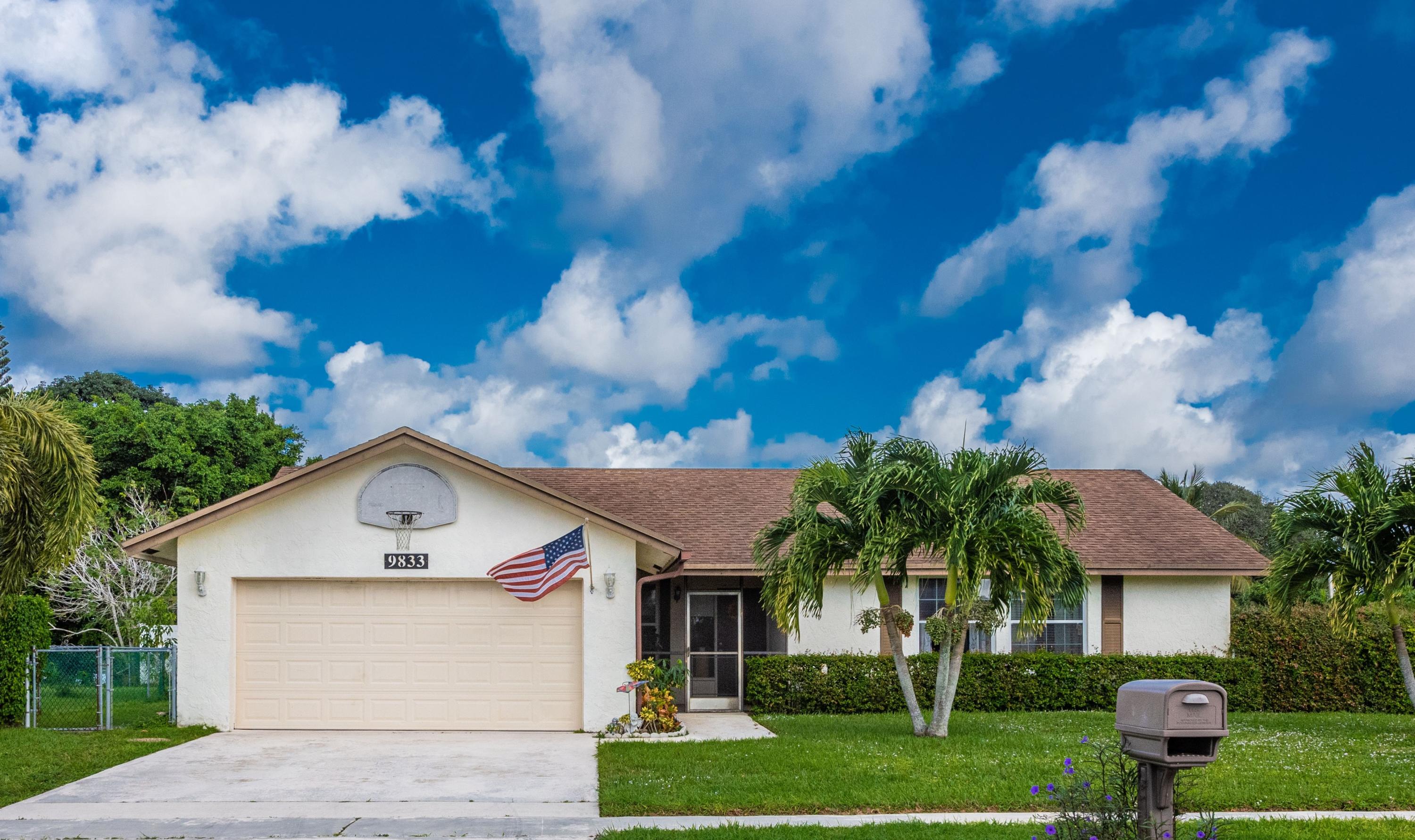 9833 Liberty Road Boca Raton, FL 33434 - Photo 1 of 46 front of house