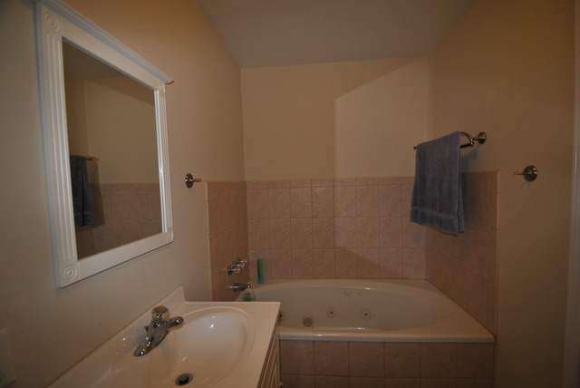 42W734 Kedeka Road Sugar Grove, IL 60554 - Photo 14 of 25 a bathroom with a sink and shower