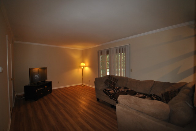 42W734 Kedeka Road Sugar Grove, IL 60554 - Photo 7 of 25 a living room with furniture and a flat screen tv