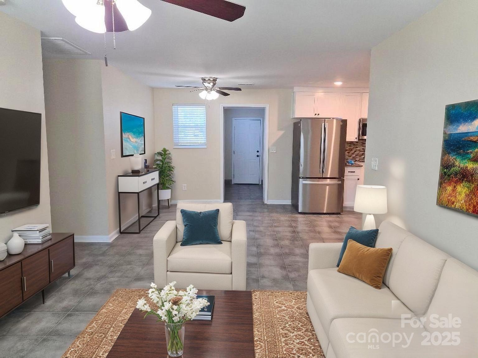 1352 Steed Street Rock Hill, SC 29732 - Photo 2 of 15 a living room with furniture and a flat screen tv