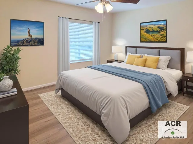 a bedroom with bed and a window