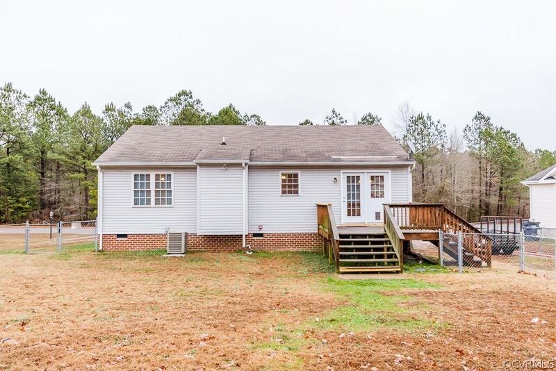 6037 Springbank Road Petersburg, VA 23803 - Photo 13 of 15 a view of a house with backyard and sitting area
