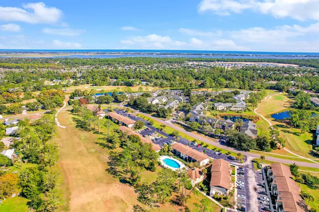 a view of city and green space